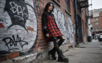 The Grunge Revival: Mastering the Oversized 90s Plaid Slip Dress as a Layering Powerhouse